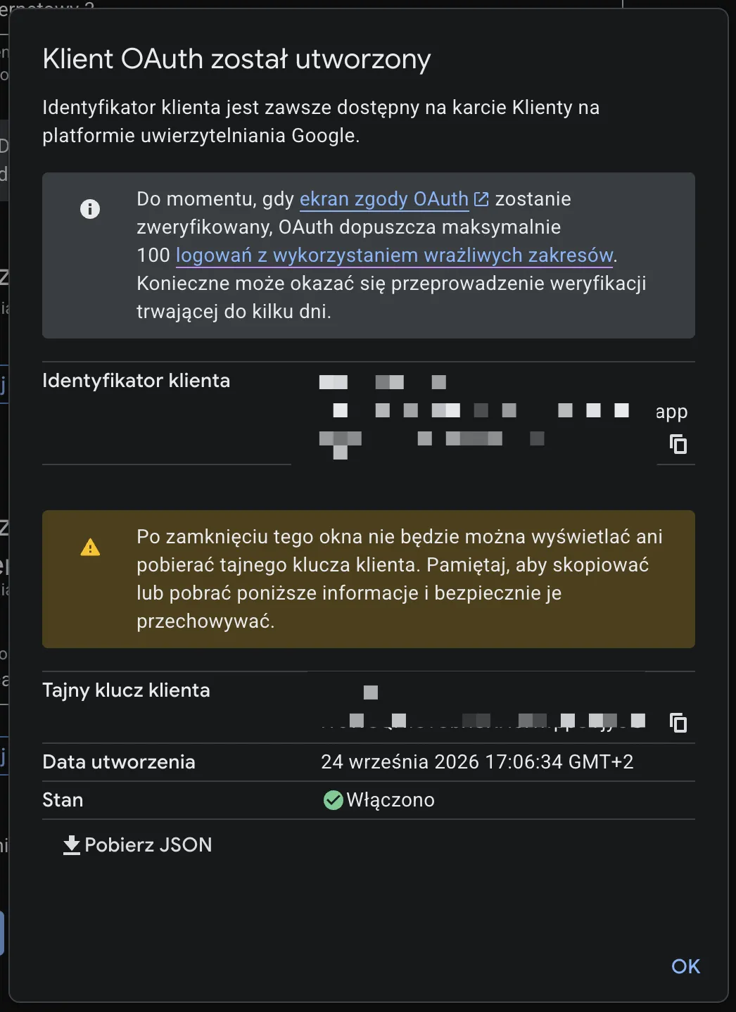 Okno Klient OAuth został utworzony - identyfikator klienta, tajny klucz klienta, ostrzeżenie o jednorazowym wyświetleniu i przycisk Pobierz JSON