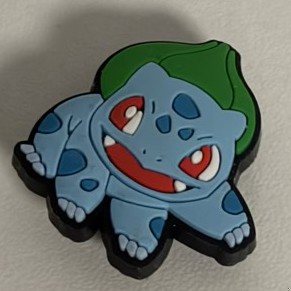 Pluszowa opaska - Bulbasaur z kolekcji Damiana Ślimaka, egzemplarz numer 10